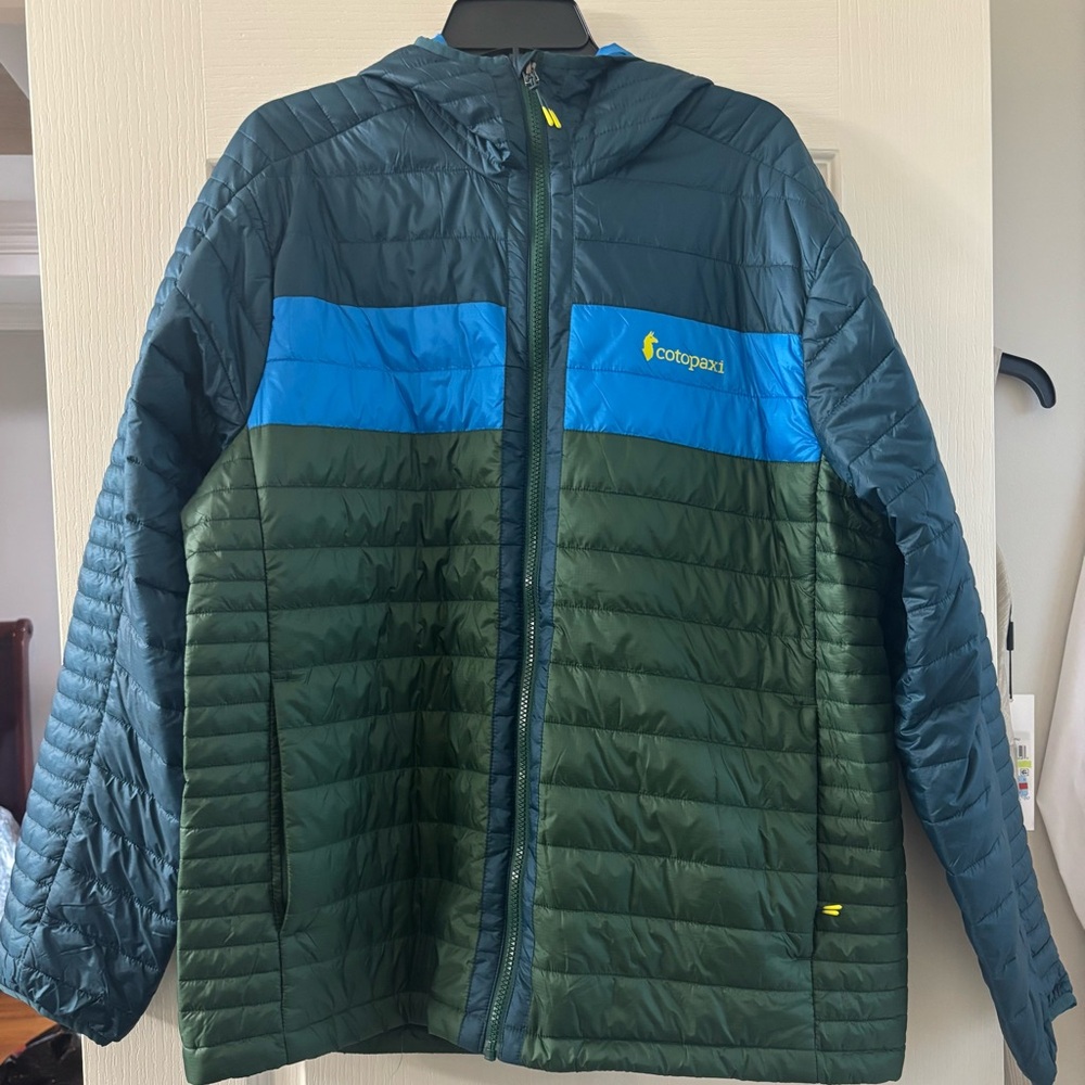 Cotopaxi Sky Blue Jacket with Yellow Logo